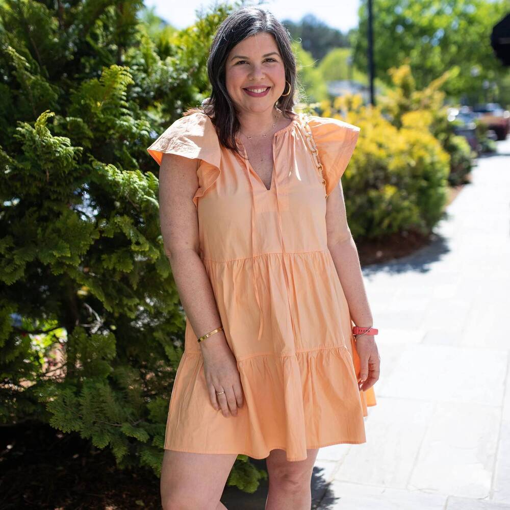 NEW PINCH cotton ruffle mini dress in peach